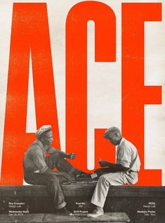 two men sitting on top of a bench next to each other in front of the word ace