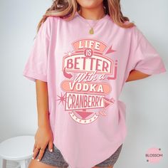 Embrace our Vodka Cranberry Cocktail shirt! This tee is perfect for anyone who loves vodka cocktails or appreciates aesthetic shirts! Treat yourself or surprise a friend with this thoughtful gift!  👕 COMFORT COLORS 1717 T-SHIRT The Comfort Colors 1717 garment-dyed unisex t-shirt is made with medium fabric consisting of high quality, 100% ring-spun US cotton for long-lasting comfort. All shirts feature pre-shrunk cotton for size retention and a signature sewn-in twill label. 👕 SIZING & CARE Shirt runs true to size. If you prefer an oversized fit, we recommend sizing up. For the desired oversized look, we personally suggest sizing up 2-3 sizes. We recommend washing inside out in cold water with like colors. Tumble dry on low or air dry for the best results.  🖨️ PRINTING PROCESS Direct-to- Vodka Cran, Vodka Cranberry Cocktail, Vodka Cranberry, Cocktail Vodka, Cranberry Vodka, Cranberry Cocktail, Bachelorette Gift, Retro Tops, Club Sweatshirts