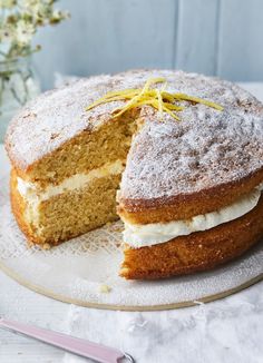 a cake that is cut in half on a plate