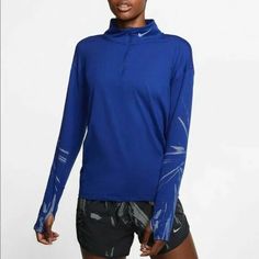 In New Condition. Blue Winter Workout Tops, Functional Blue Tops For Winter, Functional Blue Winter Tops, Nike Long Sleeve Running Top, Nike Blue Tops For Winter, Nike Blue Sportswear Top, Functional Blue Long Sleeve Tops, Blue Technical Long Sleeve Top, Technical Blue Long Sleeve Tops