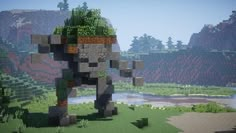 an elephant made out of small blocks in the middle of a field with trees and bushes