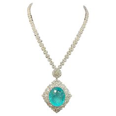 The Following Items we are offering is a Rare Important Gorgeous 18KT White Gold Glittering Diamond and Paraiba Tourmaline Necklace!!!! Necklace features Outstanding Multi Shaped Shimmering Gorgeous Extremely Rare Fancy Oval Cut Large Paraiba Tourmaline and adorned with Fancy Glittering Marquise, Pear and Round Cut Full Cut Diamonds!!! T.C.W. Approx 45CTS!!! NWT Original Retail $525,000. Comes with a Certified Gemological Certificate. A Rare Spectacular Masterpiece!!! Paraiba Tourmaline Necklace, Expensive Necklaces, Teal Jewelry, Paraiba Tourmaline, Gem Necklace, Tourmaline Necklace, Expensive Jewelry, Fancy Diamonds, Emerald Jewelry