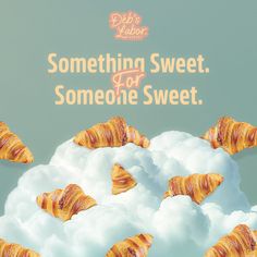 there are croissants flying in the air on top of some fluffy clouds