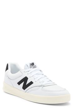 A lowkey sneaker with New Balance logo detailing provides old school charm that complements off-duty ensembles. Leather upper/synthetic lining/rubber sole Imported New Balance Lace-up Sneakers With Logo, New Balance Low-top Sneakers With Logo, Classic Sneakers With Logo And Round Toe, Classic Sneakers With Logo, New Balance Sneakers With Logo Patch For Sports, Classic Lace-up Sneakers With Logo Print, Classic New Balance Lace-up Skate Shoes, New Balance Leather Sneakers With Logo Patch, New Balance Sneakers With Logo For Streetwear