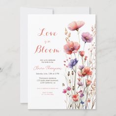 an elegant floral wedding card with pink and purple flowers on the front, in watercolor