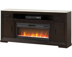 an entertainment center with a fire place and remotes on it's sideboard