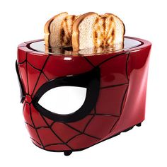 a red toaster with slices of bread in the shape of spiderman's face