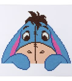 a cross - stitch pattern of a cartoon character's face with eyes and nose