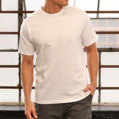 A classic tee made with classic cotton fabric. This Classic Crew tee by WSS Athletic is a basic layering shirt, work shirt, and comfortable tee. There are so many uses for this lightweight, practical t-shirt; you'll want to get multiple ones in various colors. Lucky for you, we've got them ready online and in our stores—take your pick. Regular fit. Short sleeve T-shirt. Ribbed collar. Tagless for comfort. Fabric: 100% cotton. Imported. Color: White. Relaxed Fit Pre-washed Cotton T-shirt, Patagonia Relaxed Fit Cotton T-shirt, Cheap Men's Training T-shirt, Cheap Men's Athletic Heather T-shirt, Cheap Organic Cotton Men's T-shirt, Layered Shirts, Work Shirts, Cotton Fabric, T Shirt