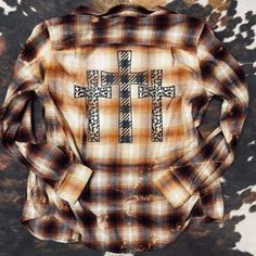 🍂 Fall Flannels 🍂 PREORDER Stamped with a faith based design and hand bleached! They are high quality, unisex in sizing, warm, and soft. No two are ever exactly the same pls make sure you express that to your customers!! Sizes XS - 3XL (they fit unisex & TTS…size up for a baggy fit). They are not 100% cotton. They are washed after bleaching so there is minimal shrinking. Print options - Jesus and Flannel Kind of Day, Three Crosses, Let me tell you about my Jesus, and Beauty from Ashes. ... Three Crosses, Fall Flannel, My Jesus, Check Shirt, Faith Based, Baggy Fits, Art Ideas, Checks, Let Me