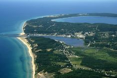 an aerial view of the ocean and land