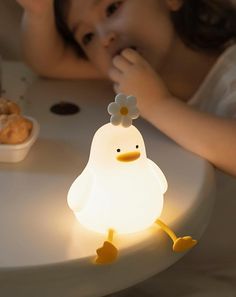 Discover the Duck Night Lamp, your new bedside must-have with comforting, gentle illumination. Effortlessly toggle between three brightness levels with a simple pinch or tap, and enjoy the convenience of its innovative mobile phone holder. Equipped with a lamp timer for automatic shut-off and a powerful 1200mAh battery for all-night use, this LED light decoration enhances any bedroom. Made from washable Silicone, ABS, and PC, it's easy to maintain for nightly bliss. Silicone Duck Lamp, Led Light Decoration, Lamp Phone, Japanese Things, Led Bedroom, Bedtime Ritual, Nighttime Routine, Light Decoration, Bedroom Lamp