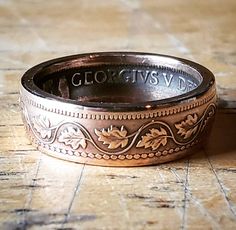 This is a Canadian 1900's to 1910's Copper Large Cent that has been crafted into a Coin Ring. It is presently a size 6, but it can be resized up to a size 9 and down to a size 4. Please be sure to let me know which size you would like. Antique Engraved Ring With Decorative Band, Vintage Engraved Ring With Historical Design, Formal Vintage Engraved Ring With Decorative Band, Vintage Engraved Ring With Decorative Band For Anniversary, Victorian Engraved Ring For Formal Occasions, Antique Rings With Historical Design For Anniversary, Vintage Engraved Ring With Antique Finish For Anniversary, Heirloom Historical Design Engraved Ring As Gift, Heirloom Engraved Ring With Historical Design