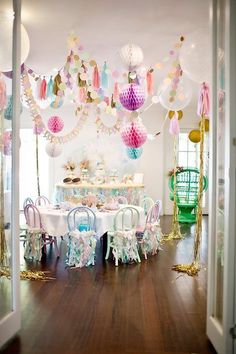 an image of a birthday party with balloons and decorations