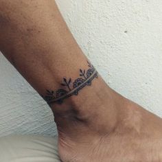 a person with a tattoo on their foot