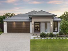 a house with a driveway in front of it