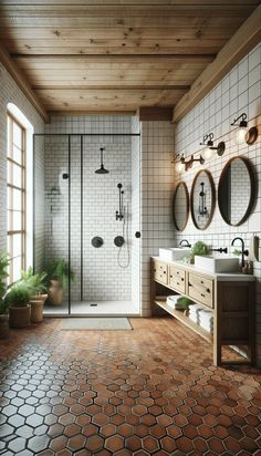 a large bathroom with two sinks and a walk in shower next to a double sink