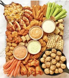 a platter filled with different types of appetizers