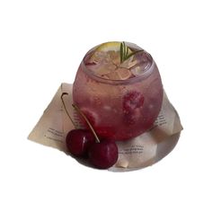 two cherries are sitting on top of a drink