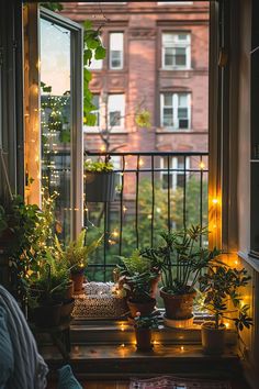 Cozy small apartment balcony design ideas with potted plants, fairy lights, and a cushioned seat, offering a warm, inviting outdoor retreat. Patio Balcony Ideas, Small Balconies, Design Creative Ideas, Patio Balcony