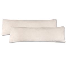 two white pillows sitting next to each other