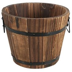 a wooden bucket with metal straps on the handles and bottom, sitting in front of a white background