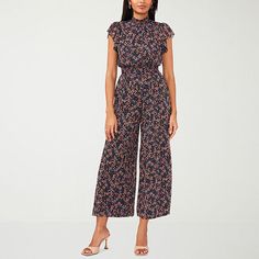 MSK's women's floral jumpsuit is made from a lightweight chiffon with a shirred elastic mock neck, flutter short sleeves, a shirred waist, wide legs, and a concealed back zip closure. Pair with with hoop earrings and stiletto sandals.Features: SmockedClosure Type: Zipper, ButtonNeckline: High NeckSleeve Length: Short SleeveSleeve Style: Flutter SleeveFiber Content: 100% PolyesterFabric Description: ChiffonInseam: 32 1/2 InCare: Tumble Dry, Machine WashCountry of Origin: Imported Retirement Party Outfits For Women, Rehearsal Dinner Outfit For Guest, Dressy Rompers Women, Dillards Women, Jump Suits, Jumpsuit For Wedding Guest, Rehearsal Dinner Outfits, Breezy Outfit, Rompers Dressy