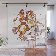 a woman riding on the back of a horse wall mural