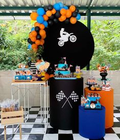 a motorcycle themed birthday party with balloons and decorations