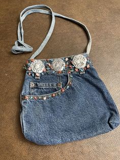 This denim crossbody bag has some loose beads and minor wear but still in good condition. Please review all photos and measurements carefully before purchasing . Feel free to ask questions. All sales are final. Thank you! Denim Crossbody Bag, Denim Bag Patterns, Hand Heart, Denim Crossbody, Denim Purse, Heart Hands, Denim Bag, Pocket Book, Small Crossbody Bag