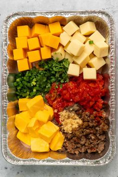 a tray filled with lots of different types of food