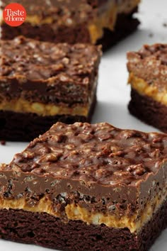 several pieces of chocolate cake on a white plate