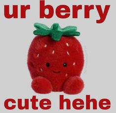 a red stuffed strawberry sitting on top of a white sign that says, ur berry cute hehe