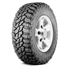 an all terrain tire on a white background