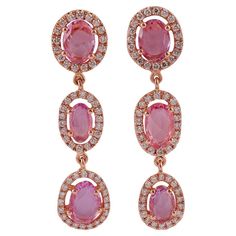 These are an exclusive earrings with Pink sapphire & diamonds features 6 pieces of Sapphire weight 2.86 carats, surrounded with 111 pieces of round brilliant cut of diamonds weight 0.69 carats, These entire earrings are studded in 18k rose Gold. earrings have a simple pull & push mechanism. Luxury Gold Jewelry With Pink Sapphire, Luxury Pink Rose Cut Diamond Earrings, Sapphire And Diamond Earrings, Dope Jewelry, Diamond Earring, Large Gift, Pink Earrings, Dream Jewelry, Rose Gold Earrings