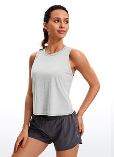 Ultra-lightweight and soft fabric with good breathability to keep you cool, and ultra-fine brushed feel for a comfortable and skin-friendly experience. High neck sport tank top with oversized armholes allows you to move freely without restraint. Great for running, exercise and other intense sports. Feature & Fitting: 
 Design for running, exercise 
 Cropped length, loose-fitting 
 Oversized armholes and high neck 
 Fabric: 
 Soft and lightweight fabric 
 Ultra-fine brushed feel 
 Four-way st Comfortable Stretch Gray Tops, Comfortable Gray Stretch Top, Gray Go-dry Tops For Light Sports, 4-way Stretch Sleeveless Activewear For Light Exercise, Sleeveless 4-way Stretch Tops For Light Sports, Sleeveless 4-way Stretch Moisture-wicking Sports Bra, Breathable Racerback Tops Sportswear, Breathable Racerback Sportswear Tops, Breathable Racerback Tops For Sportswear