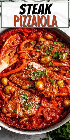 a large pot filled with meat and vegetables on top of a table next to some parsley