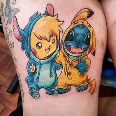 two cartoon tattoos on the legs of someone's thighs, one with a yellow and blue outfit