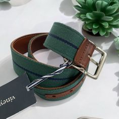 Elevate Your Style With Mens Vineyard Vines Reversible Leather Webbing Belt Upgrade Your Wardrobe With The Versatile And Stylish Mens Vineyard Vines Nwt Reversible Leather Webbing Green & Navy Stripe Belt. This Belt Features A Premium Leather On One Side Of The Belt Strap And In Green And Navy Stripe Webbing On The Other Side, Offering A Sophisticated Touch To Any Outfit. Its Reversible Design Allows For Two Different Looks In One, Making It Perfect For Any Occasion. Crafted With High-Quality Ma Webbing Belt, Mens Green, Navy Stripes, Upgrade Your Wardrobe, Green Brown, Vineyard Vines, Green And Brown, The Other Side, Vines