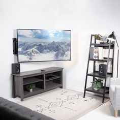 a flat screen tv mounted to the side of a wall