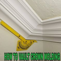 how to vault crown molding in the corner of a room with yellow measuring tape