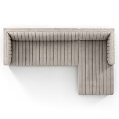 an upholstered couch with pleated fabric on the back and sides, viewed from above