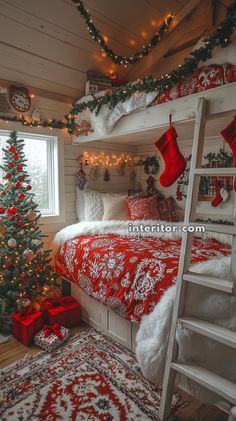 a bedroom decorated for christmas with red and white bedding, stockings on the tree