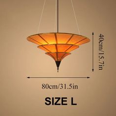 the measurements for a hanging light fixture are shown in different sizes and colors, including yellow