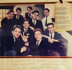 a group of men in suits and ties posing for a photo with the caption