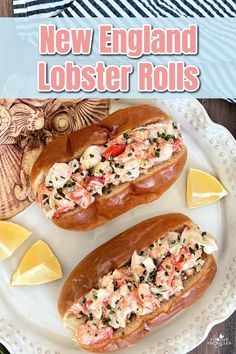 two lobster rolls on a white plate with lemon wedges next to it and the title reads new england lobster rolls