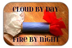 a paper mache with the words cloud by day fire by night