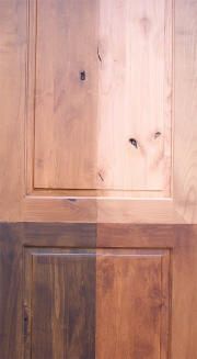 a close up of a wooden cabinet door