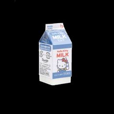 a carton of hello kitty milk on a blue background