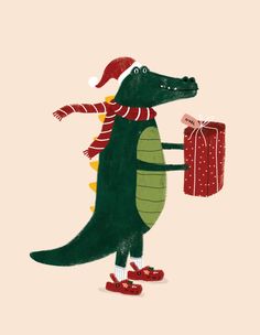 an alligator wearing a santa hat and holding a present